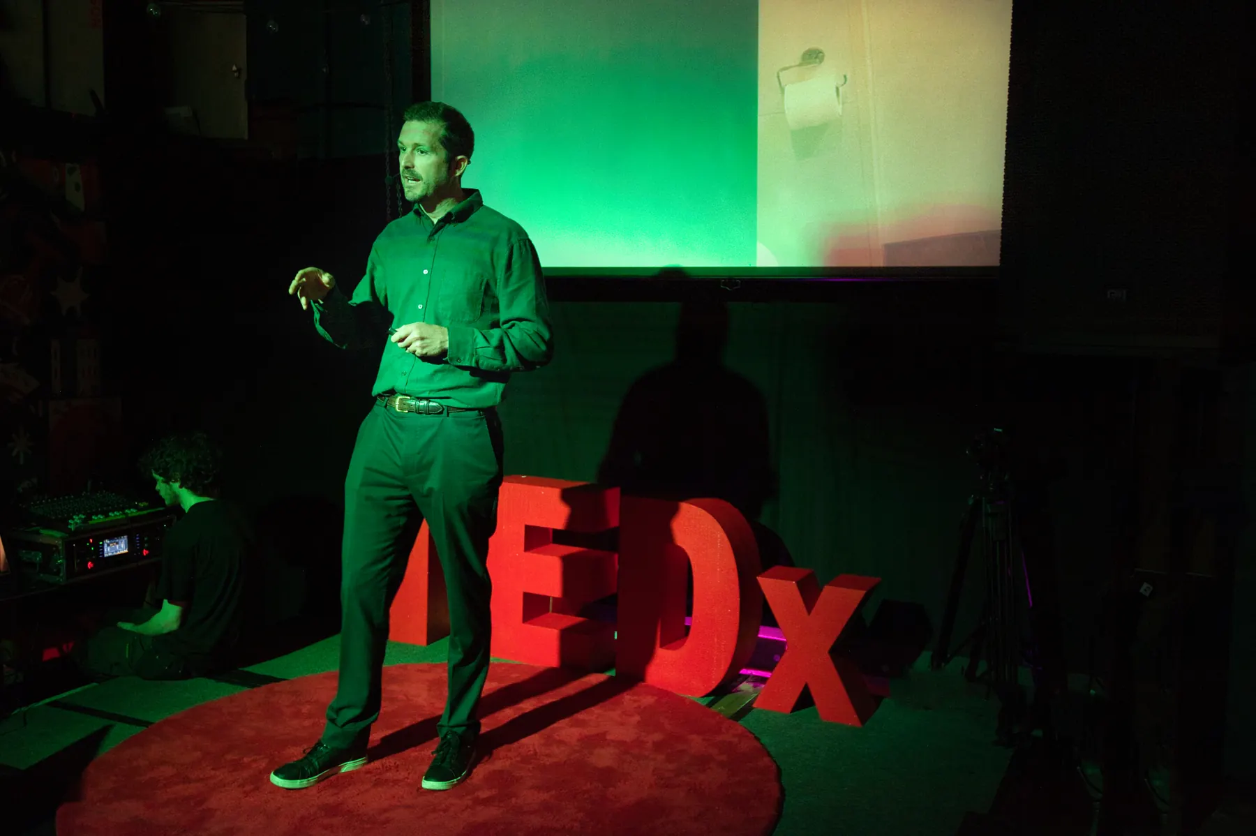 Nat Baldwin speaking on the TEDxLeith stage