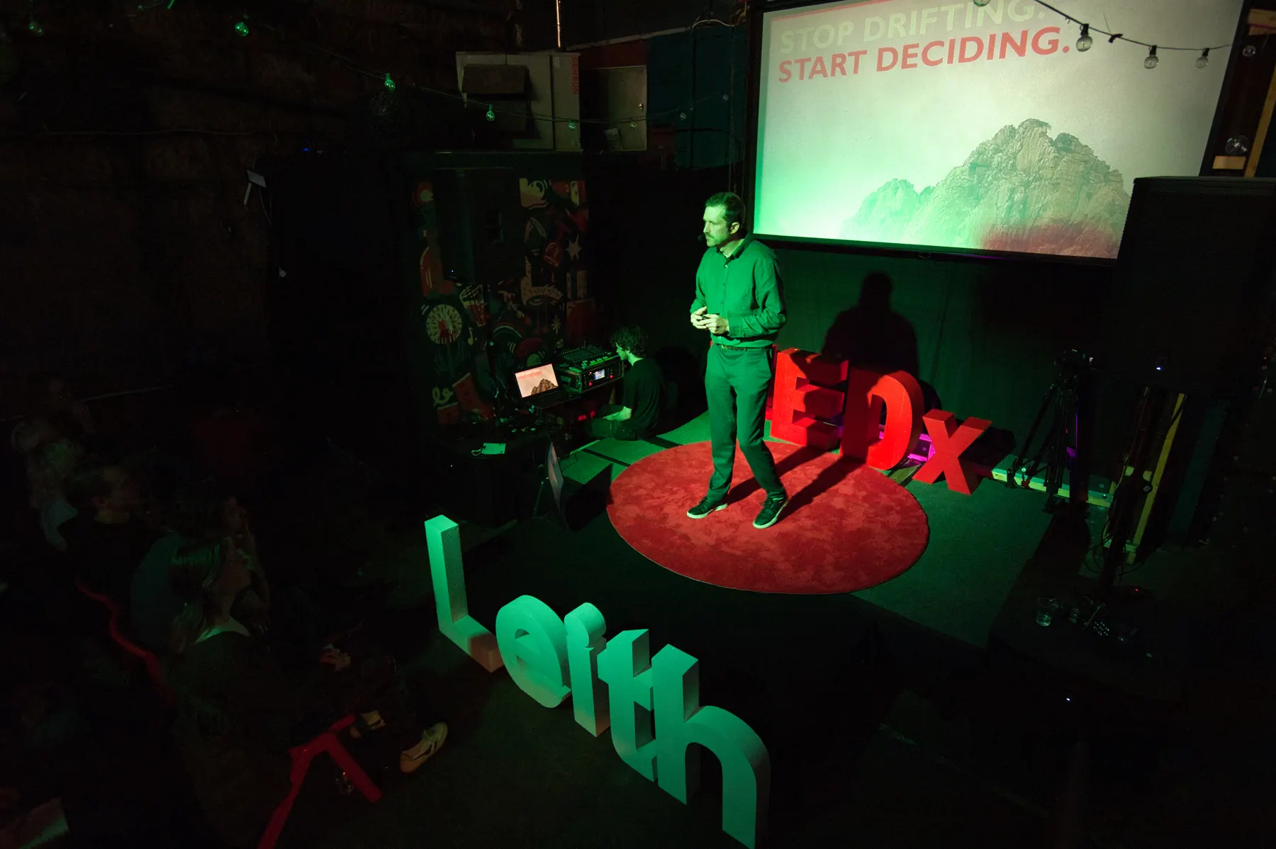 Nat Baldwin on stage at TEDxLeith